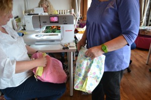 Miss H & Quilt Fairy Gina putting together bag bits